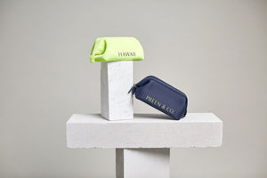 Neon yellow and Dark blue cosmetic case, designed to protect cosmetics in the hot and cold environments 
